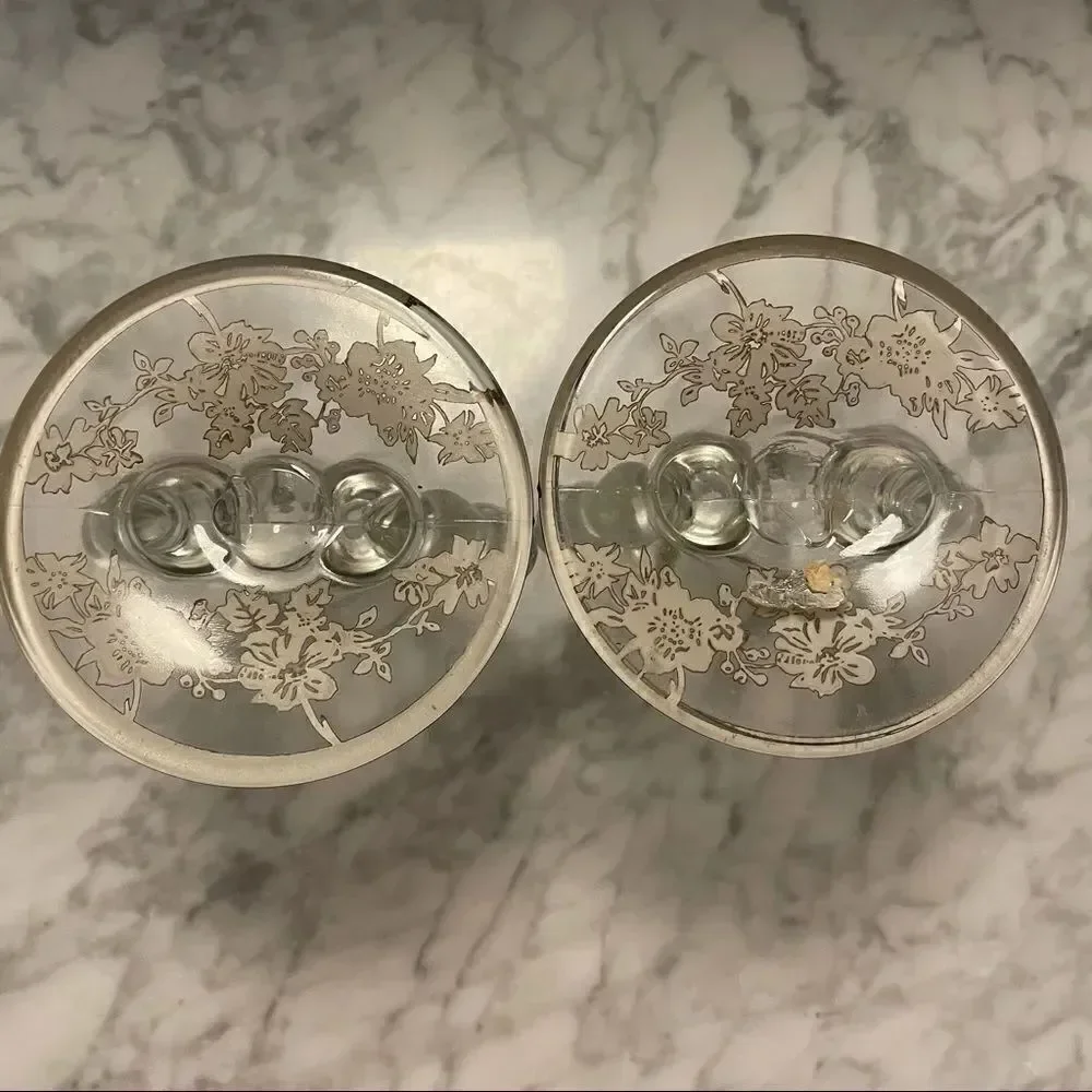 Pair of Circle Silver Overlay Floral Candesticks